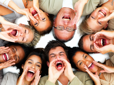 Closeup of business people lying against white background and sh
